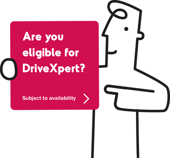 Man carrying a box reading Are you eligible for DriveXpert? Subject to availability